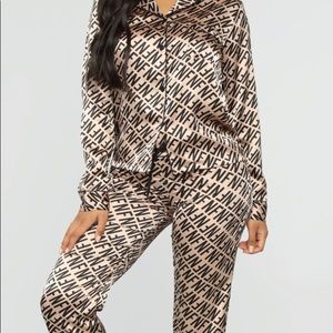 Fashion Nova Silk Set logo